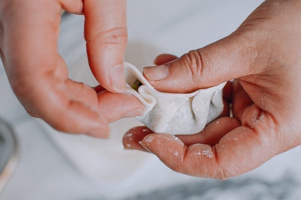 Pleating dumpling towards the middle
