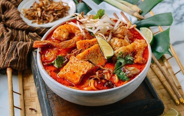 Bowl of spicy curry laksa, thewoksoflife.com