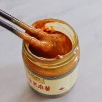 Stirring jar of Chinese sesame paste, thewoksoflife.com