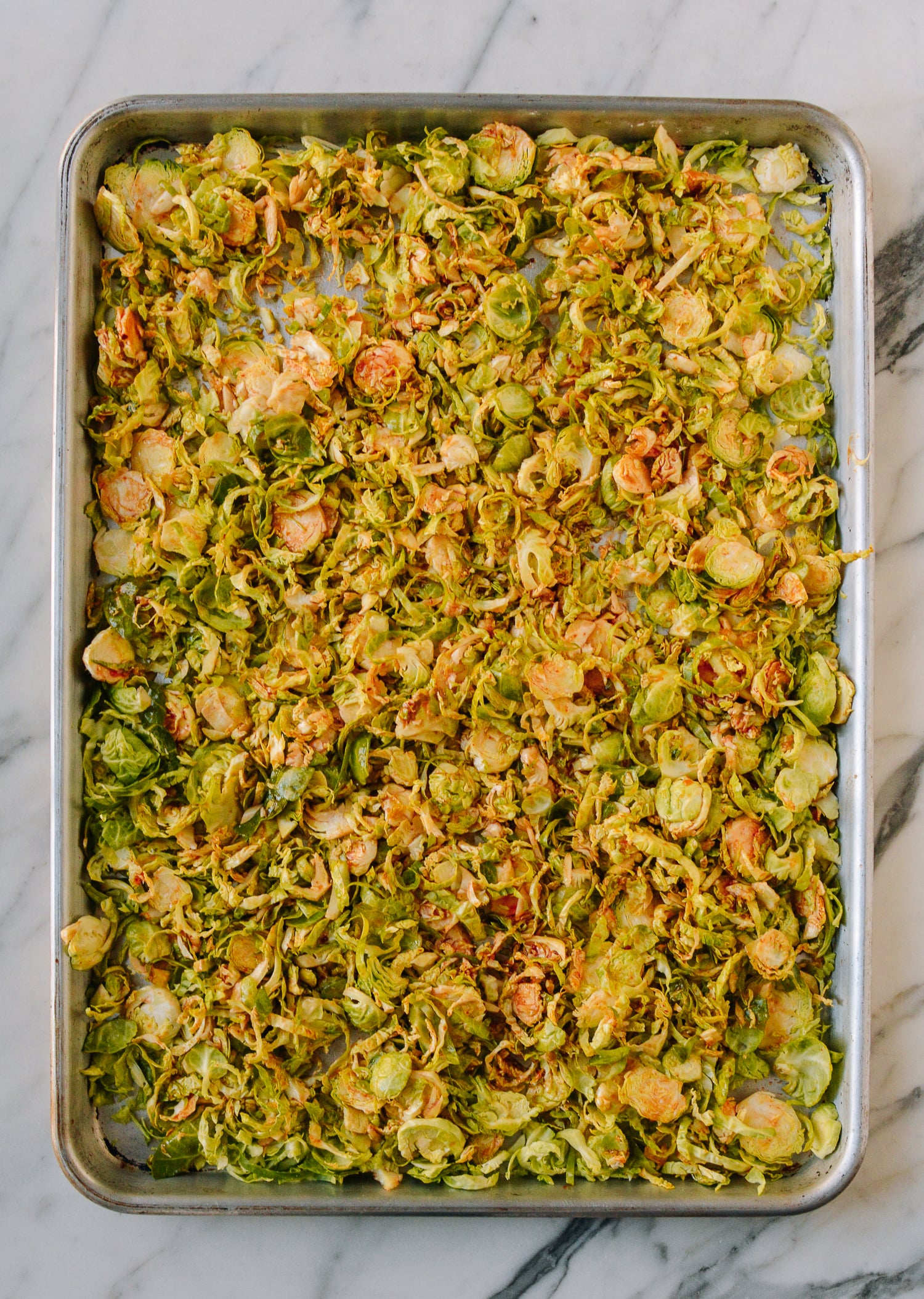 Brussels sprouts tossed in spicy sweet sauce, thewoksoflife.com
