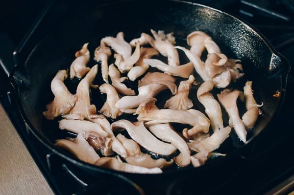 Oyster mushrooms in cast iron skillet, thewoksoflife.com