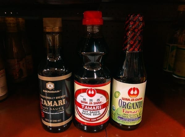 Different brands of tamari on store shelf, thewoksoflife.com