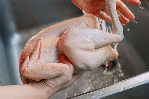 Rinsing whole chicken, thewoksoflife.com