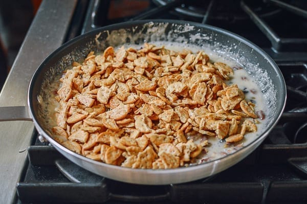 Adding crackers to marshmallow mixture, thewoksoflife.com