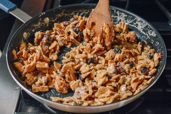 Stirring marshmallow treat mixture, thewoksoflife.com