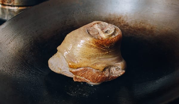 Searing pork shank, thewoksoflife.com