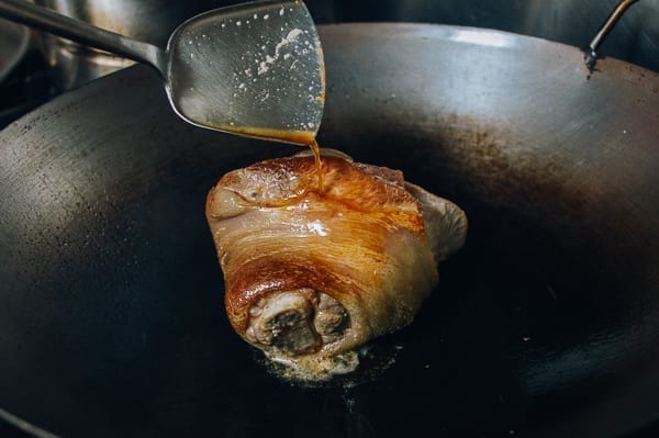 Using hot oil to sear pork front hock, thewoksoflife.com