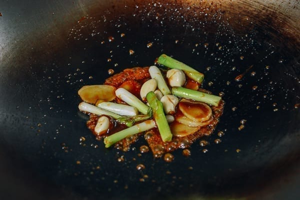 Aromatics and sugar in wok, thewoksoflife.com