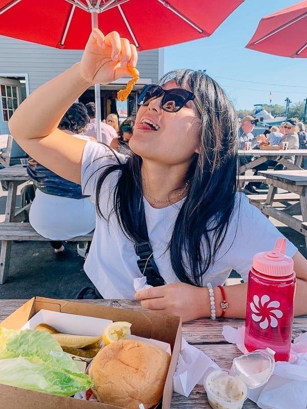 Kaitlin eating clam strips, thewoksoflife.com