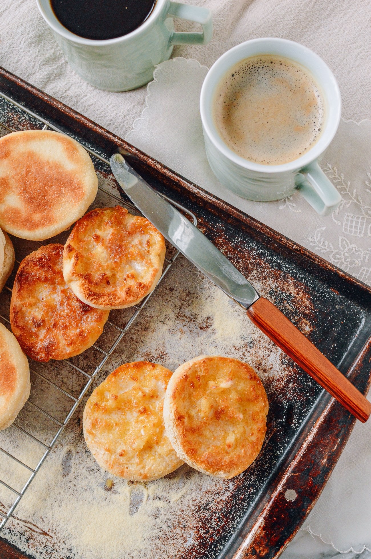 Buttered homemade english muffins with nooks and crannies