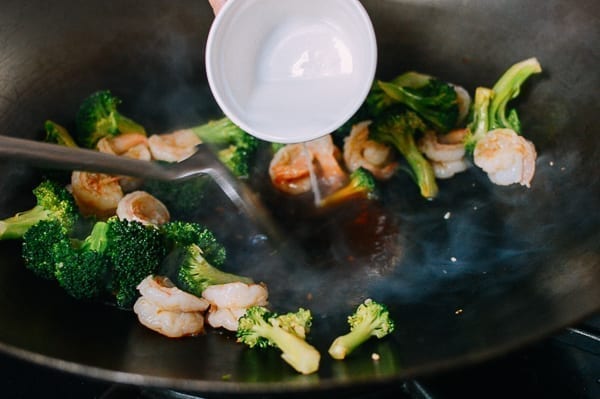 Pouring cornstarch into wok, thewoksoflife.com