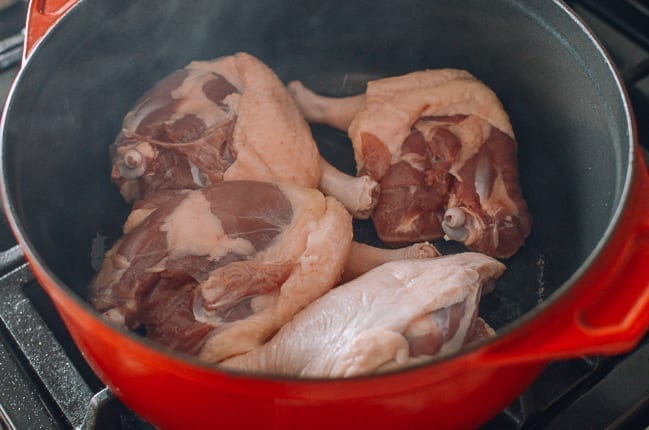 Searing duck legs skin side down, thewoksoflife.com