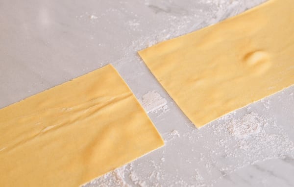 Cutting dough in half, thewoksoflife.com