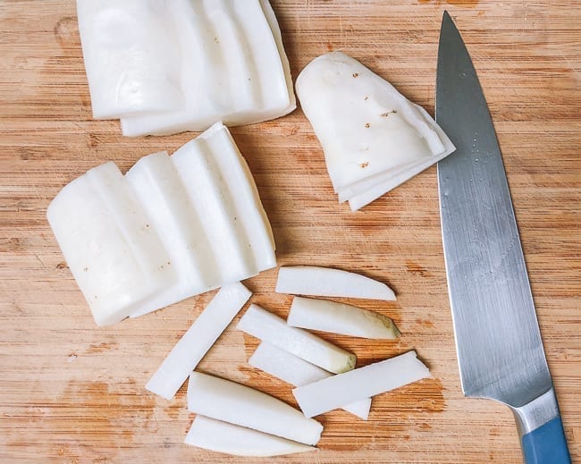 Cutting daikon radish into pieces, thewoksoflife.com