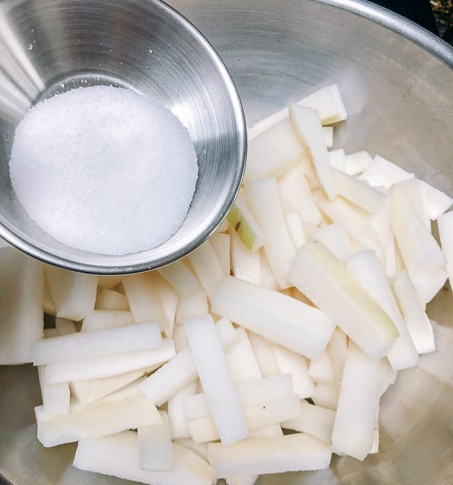 Salting daikon radish pieces, thewoksofilfe.com