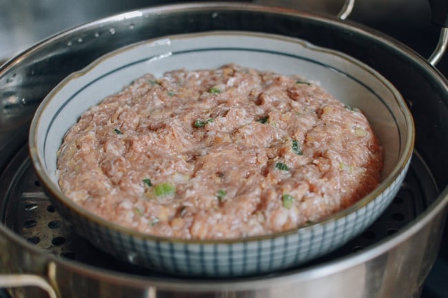 Pork patty in steamer, thewoksoflife.com