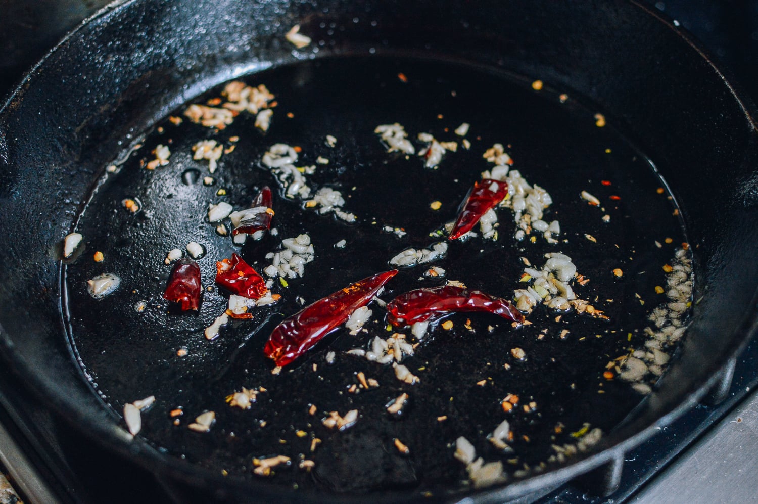 Cooking garlic and chilies, thewoksoflife.com