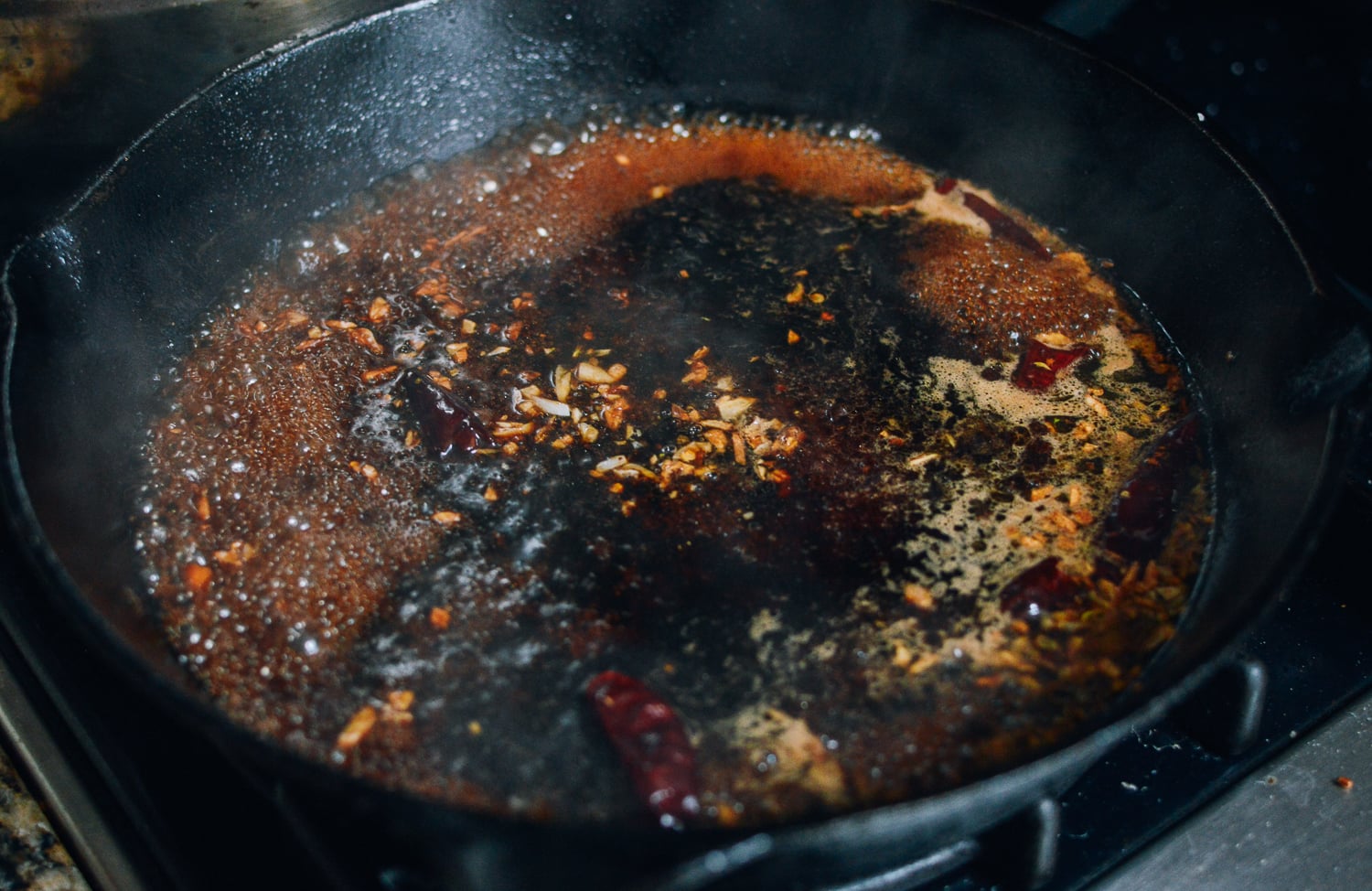 Simmering General Tso's Sauce, thewoksoflife.com