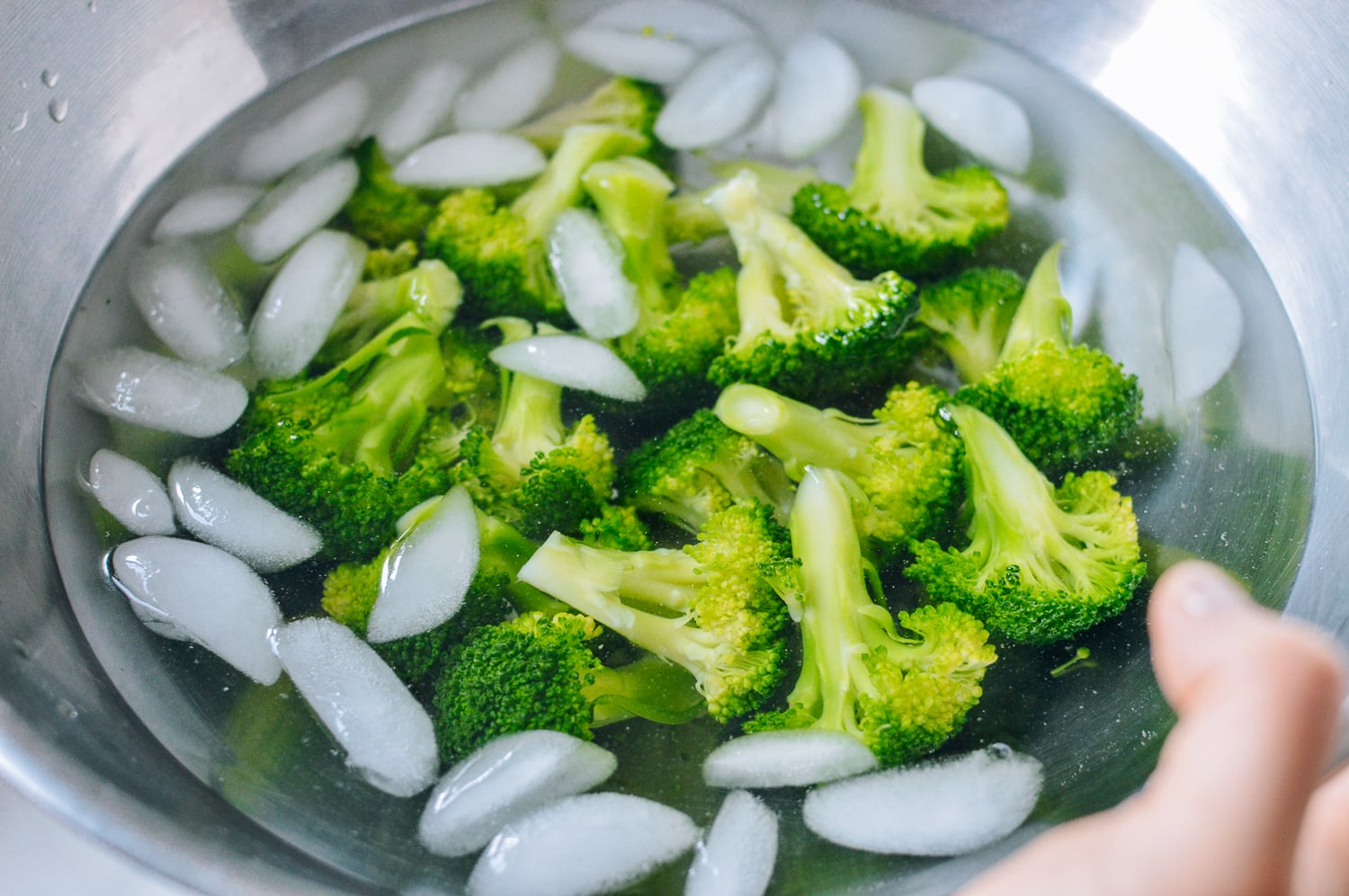 Blanched Broccoli in ice bath, thewoksoflife.com