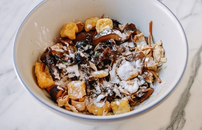 Adding cornstarch to the mixture, thewokosflife.com