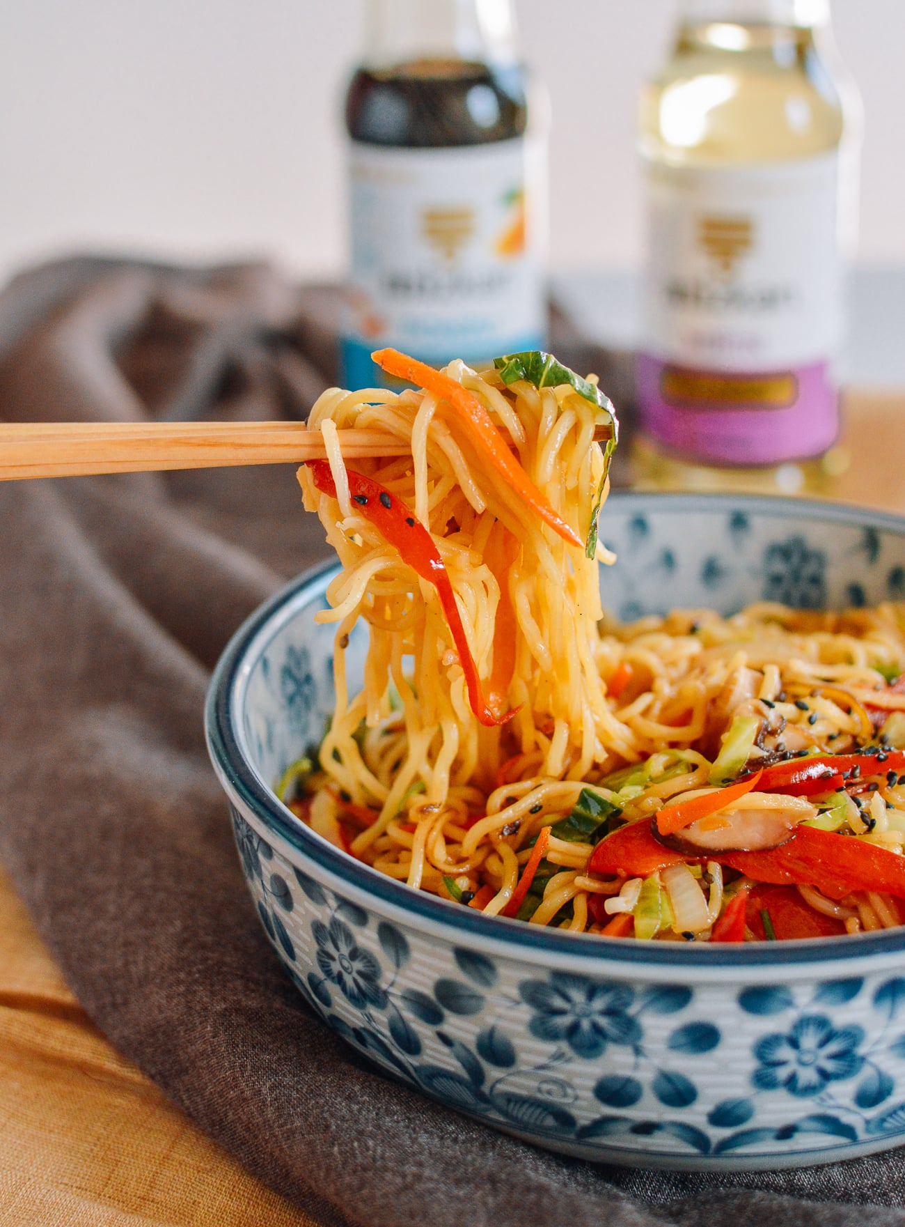 Lifting yakisoba noodles with chopsticks