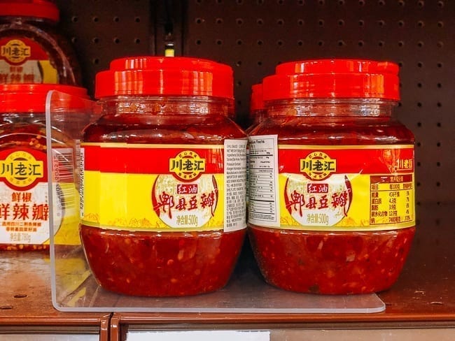 Jars of doubanjiang on store shelf, thewoksoflife.com