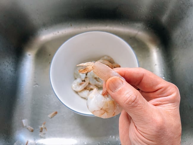 Peeled shrimp with tail meat still intact, thewoksoflife.com