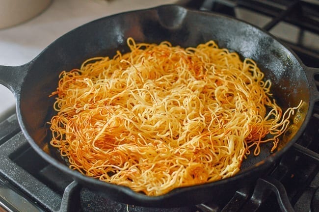 Flipping pan-fried noodles, thewoksoflife.com