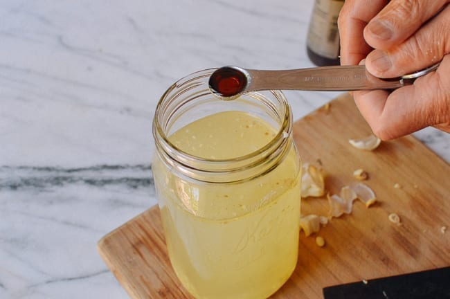 Adding sesame oil to stir-fry sauce, thewoksoflife.com