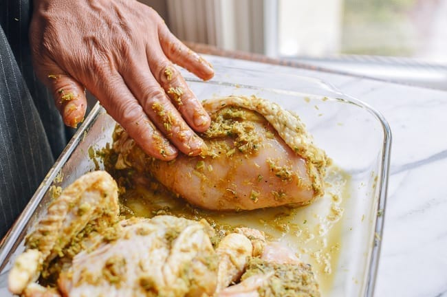 Rubbing marinade into chicken pieces, thewoksoflife.com