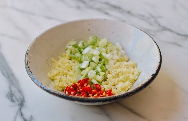 Bowl with ginger, garlic, scallions, thai chili, thewoksoflife.com