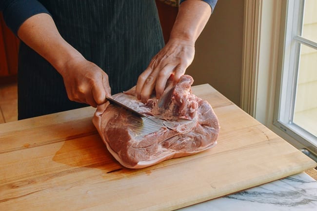De-boning pork picnic shoulder, thewoksoflife.com