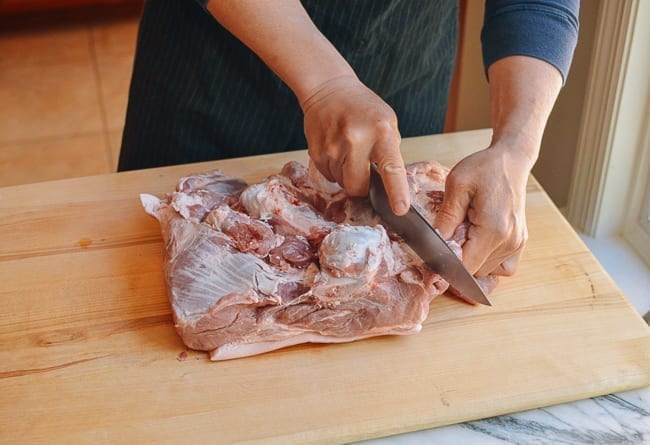 Exposed bone in pork shoulder, thewoksoflife.com