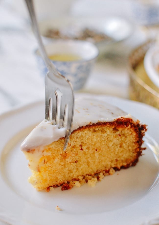 Fork cutting through osmanthus cake slice, thewoksoflife.com