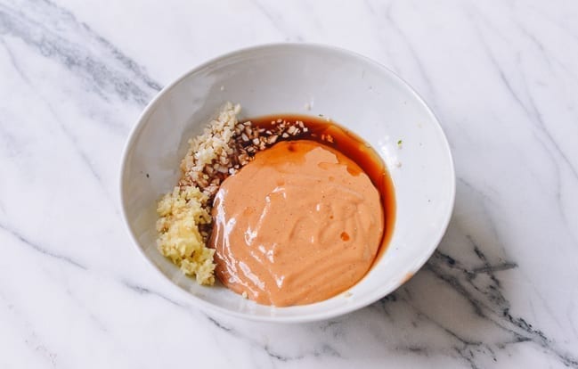 Mixing peanut sauce, thewoksoflife.com