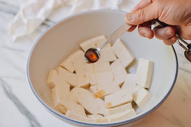 Adding sesame oil tofu, thewoksoflife.com