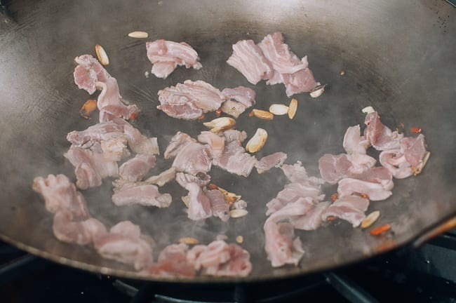 Garlic, Chilies, Pork Belly in wok, thewoksoflife.com