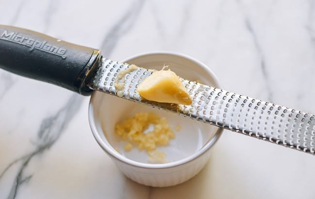 Grating ginger, thewoksoflife.com