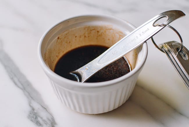 Mixing dressing in small bowl, thewoksoflife.com