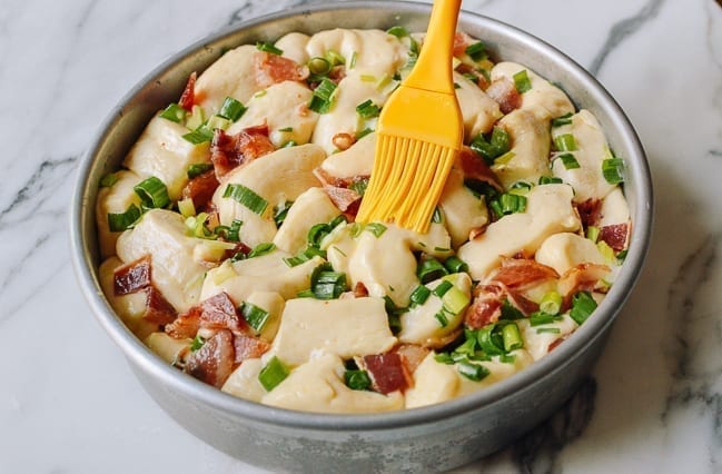 Brushing proofed dough with egg wash