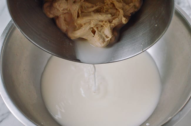 Pouring off starchy water, thewoksoflife.com