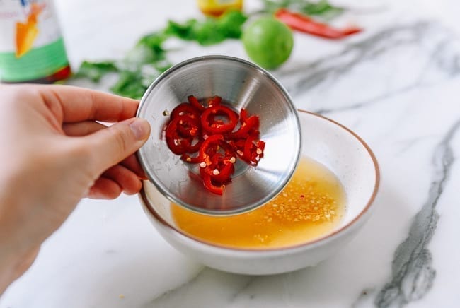Adding chilies, thewoksoflife.com