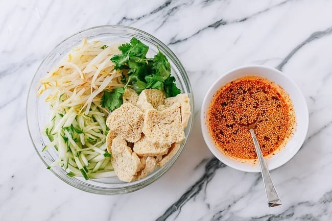 Liangpi noodles, mix-ins, and sauce, thewoksoflife.com