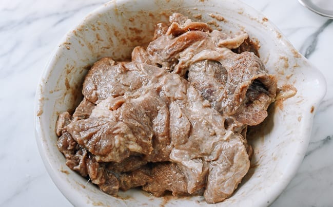 Pork chops coated in potato starch paste, thewoksoflife.com