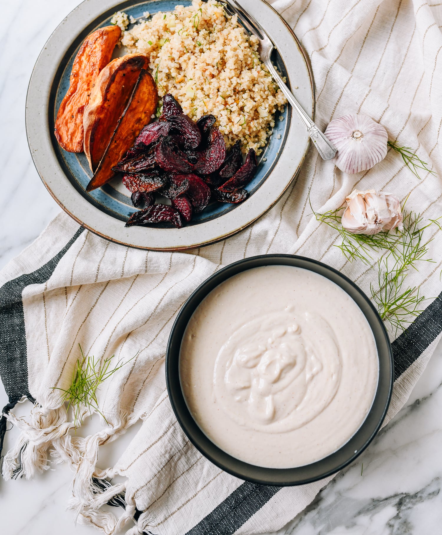 Tofu garlic aioli, served with roasted vegetables and quinoa, thewoksoflife.com