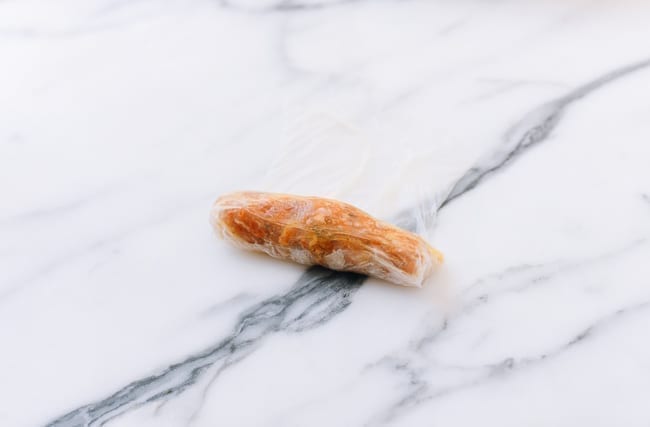 Rolling Vietnamese rice paper roll, thewoksoflife.com