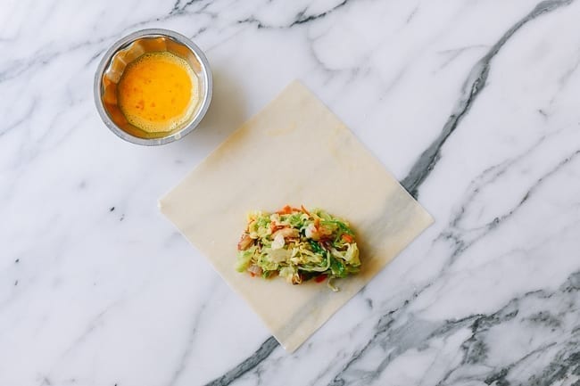 Egg Roll filling on wrapper, thewoksoflife.com