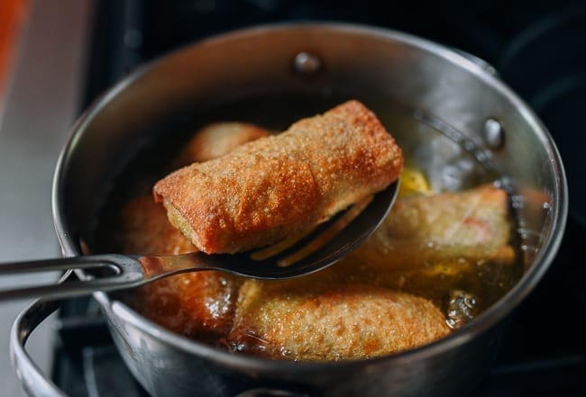 Frying egg rolls, thewoksoflife.com