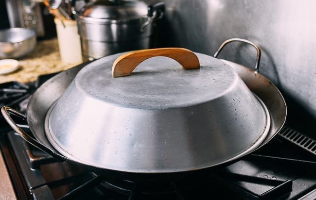 Wok with cover on it