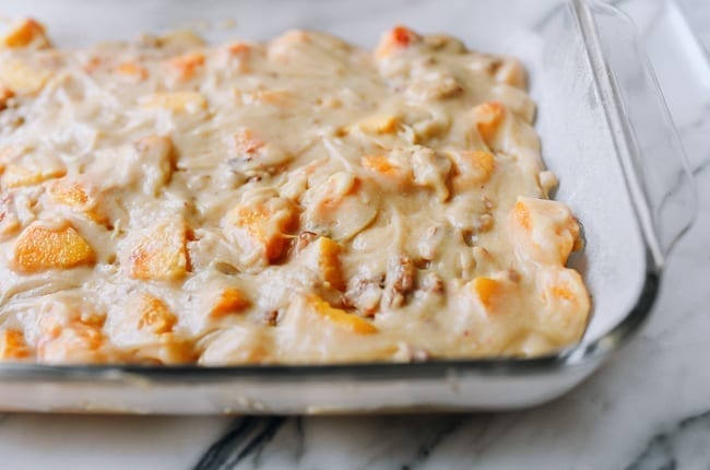 Batter spread out in prepared pan, thewoksoflife.com